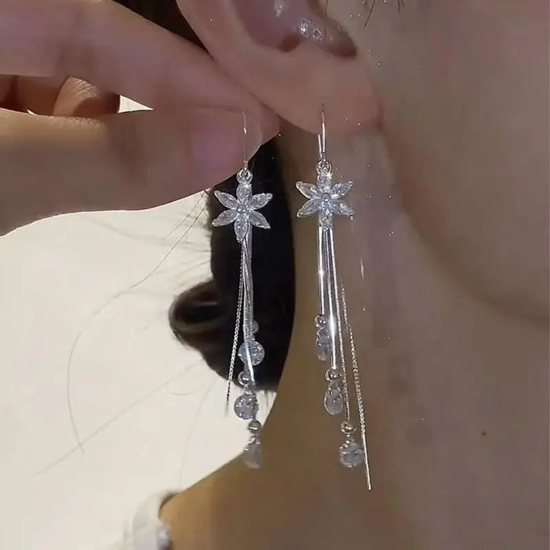 Crystal Flower Long Drop Earrings in Silver The Style Closet