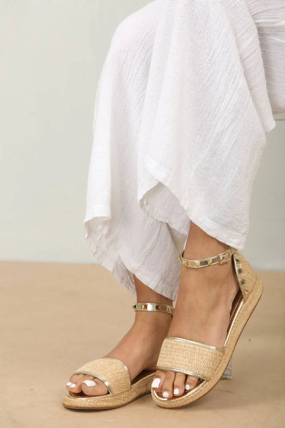 STUDDED RAFFIA CLOSED BACK ANKLE STRAP SANDALS IN GOLD The Style Closet