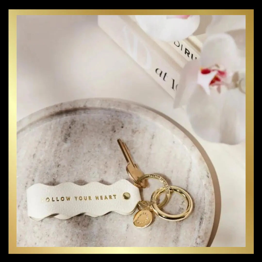 'Follow Your Heart' Sentiment Wave Keyring in Ecru by Katie Loxton Katie Loxton