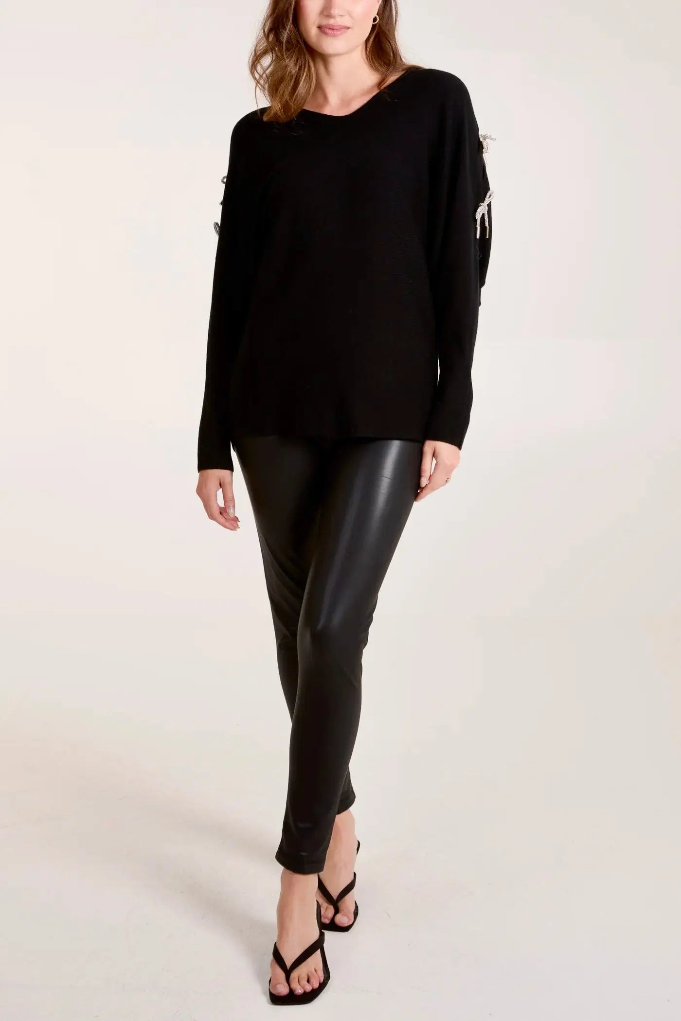 GLITTER BOW CUT OUT SLEEVE JUMPER The Style Closet