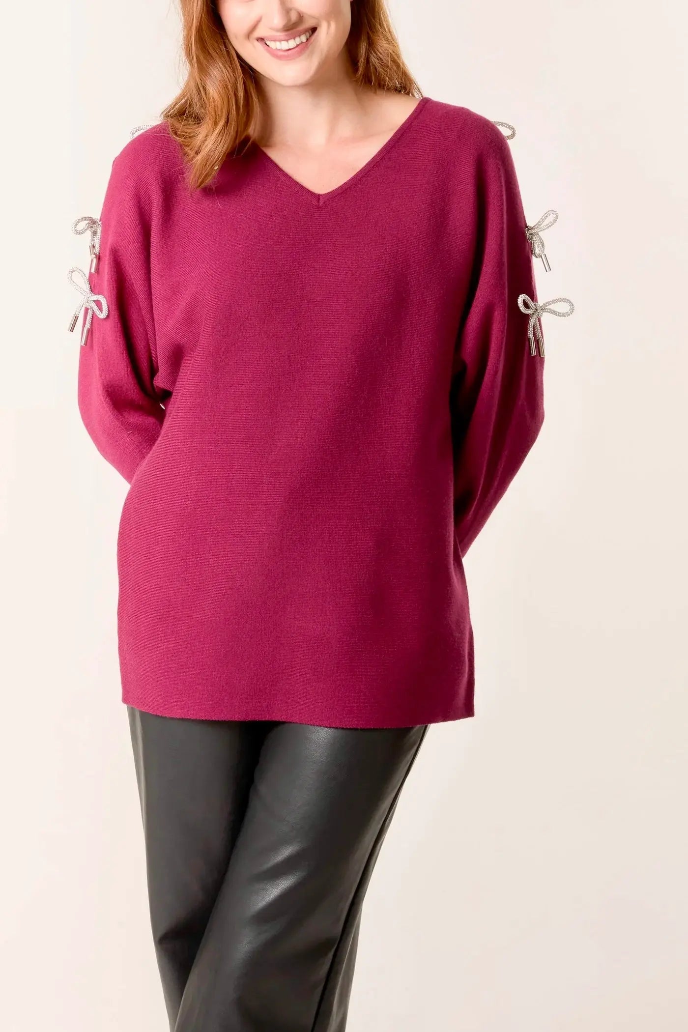 GLITTER BOW CUT OUT SLEEVE JUMPER The Style Closet