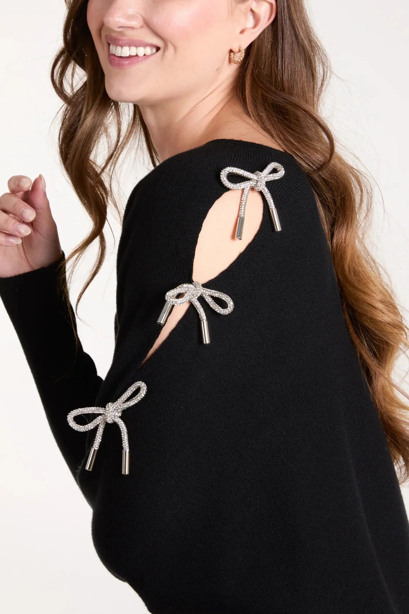 GLITTER BOW CUT OUT SLEEVE JUMPER The Style Closet