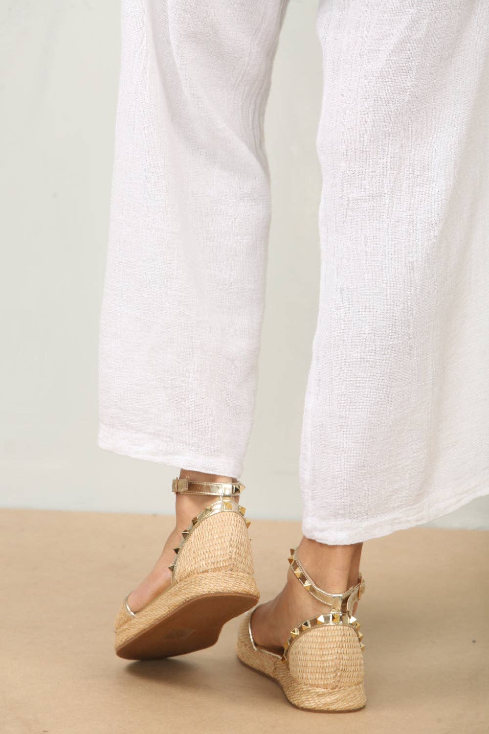 STUDDED RAFFIA CLOSED BACK ANKLE STRAP SANDALS IN GOLD