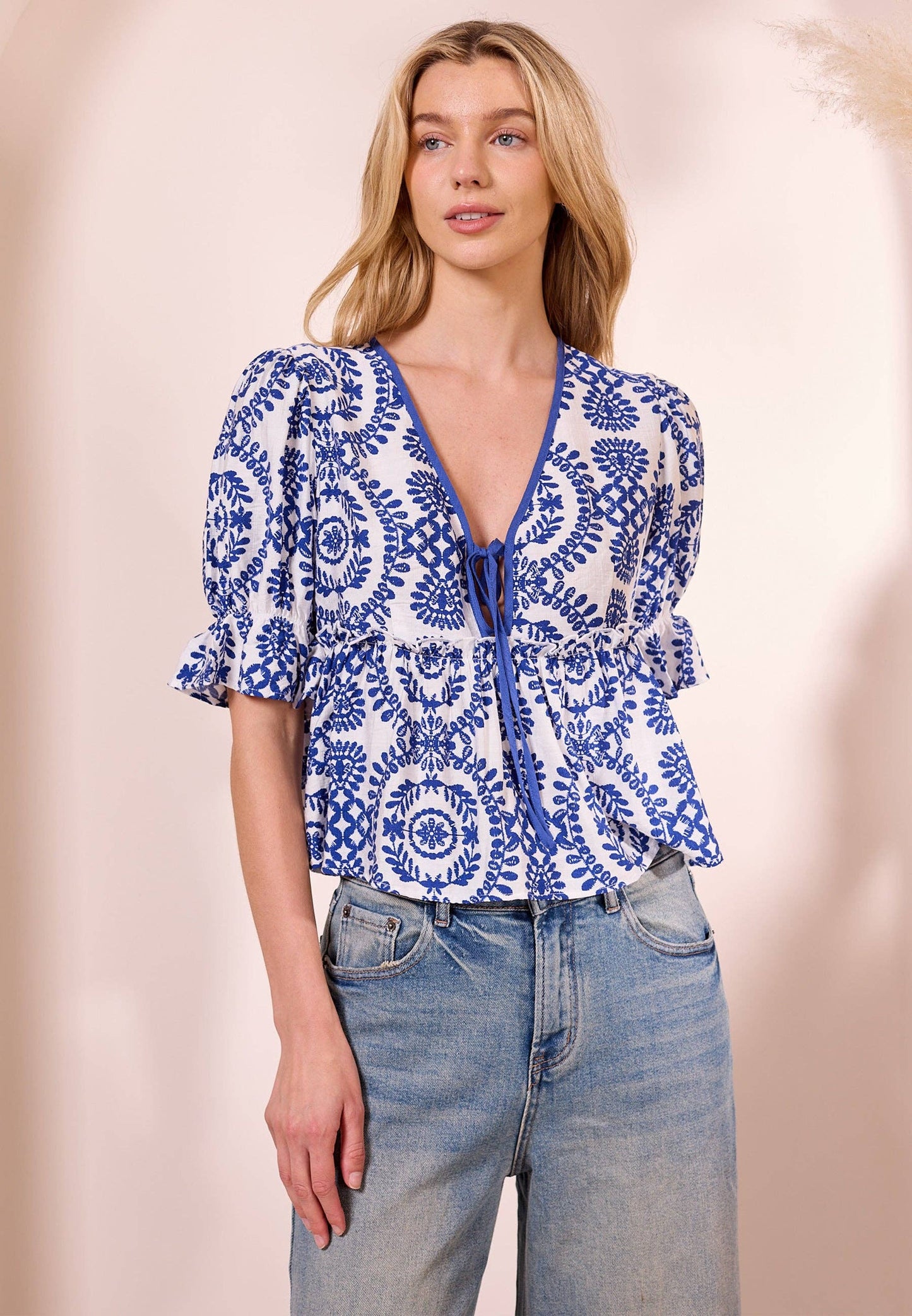White Peplum Top with Blue Embroidery Print: XL