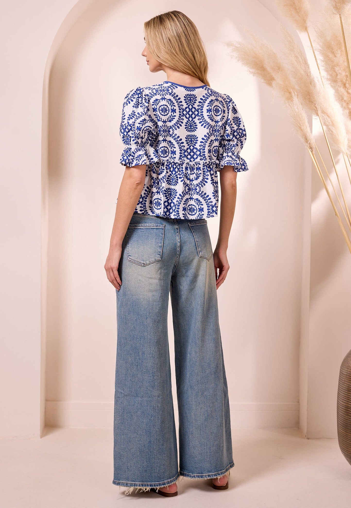 White Peplum Top with Blue Embroidery Print: XL