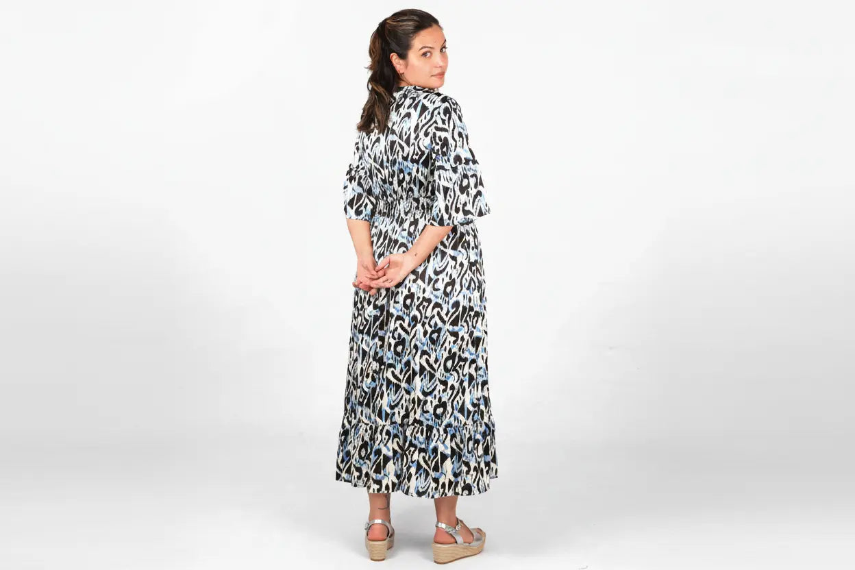 Abstract Ikat Print V-Neck Shirred Maxi Dress in Blue The Style Closet