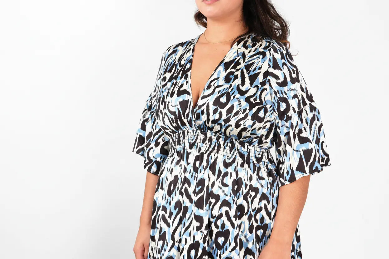 Abstract Ikat Print V-Neck Shirred Maxi Dress in Blue The Style Closet