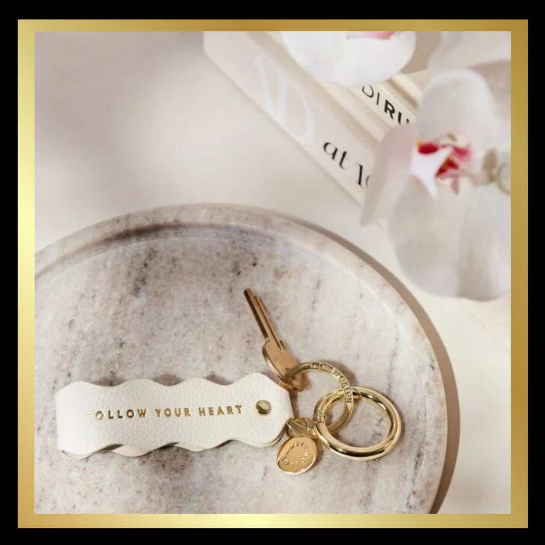 'Follow Your Heart' Sentiment Wave Keyring in Ecru by Katie Loxton