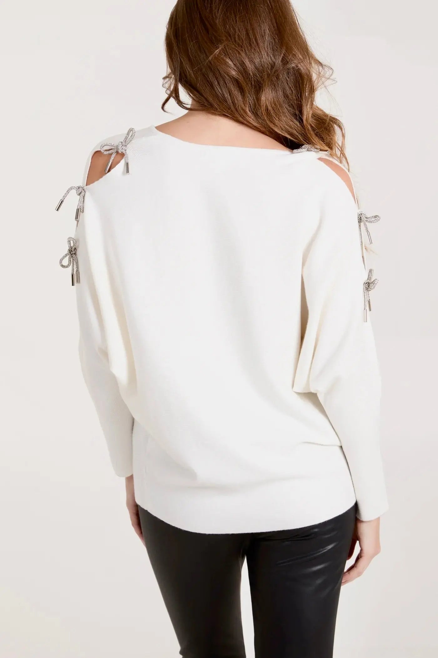 GLITTER BOW CUT OUT SLEEVE JUMPER The Style Closet
