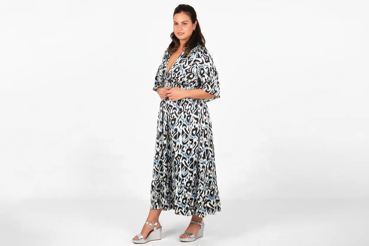 Abstract Ikat Print V-Neck Shirred Maxi Dress in Blue The Style Closet